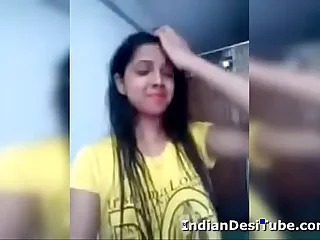 Desi Indian Cute Girl Undressing Fingering Pussy IndianDesiTube.com